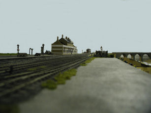View south with platform on left and partially completed station building